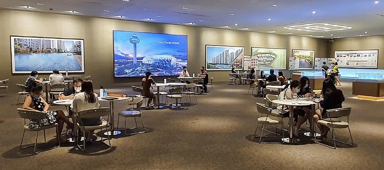 The show gallery of condominium development Treasure At Tampines, which sold 104 units last month at a median price of $1,348 psf. The 998 non-landed private homes sold last month was the highest number of monthly sales recorded for June in seven yea