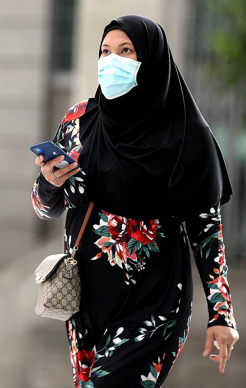 Sa'adiah Jamari is accused of two counts of giving poisons to the baby girls with the intention of hurting them. ST PHOTO: WONG KWAI CHOW