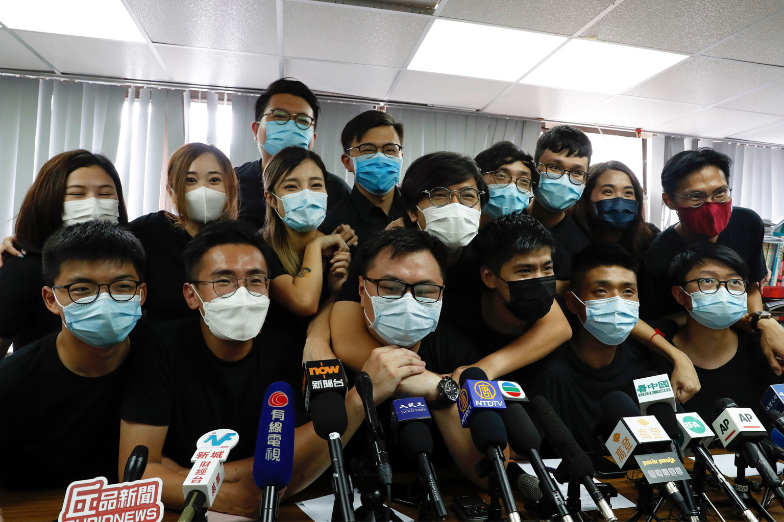 Young Hong Kong democrats from the self-dubbed "resistance camp" (right) did especially well during an unofficial primary vote. Older, more traditional candidates made up a smaller selection of the winners. PHOTO: REUTERS
