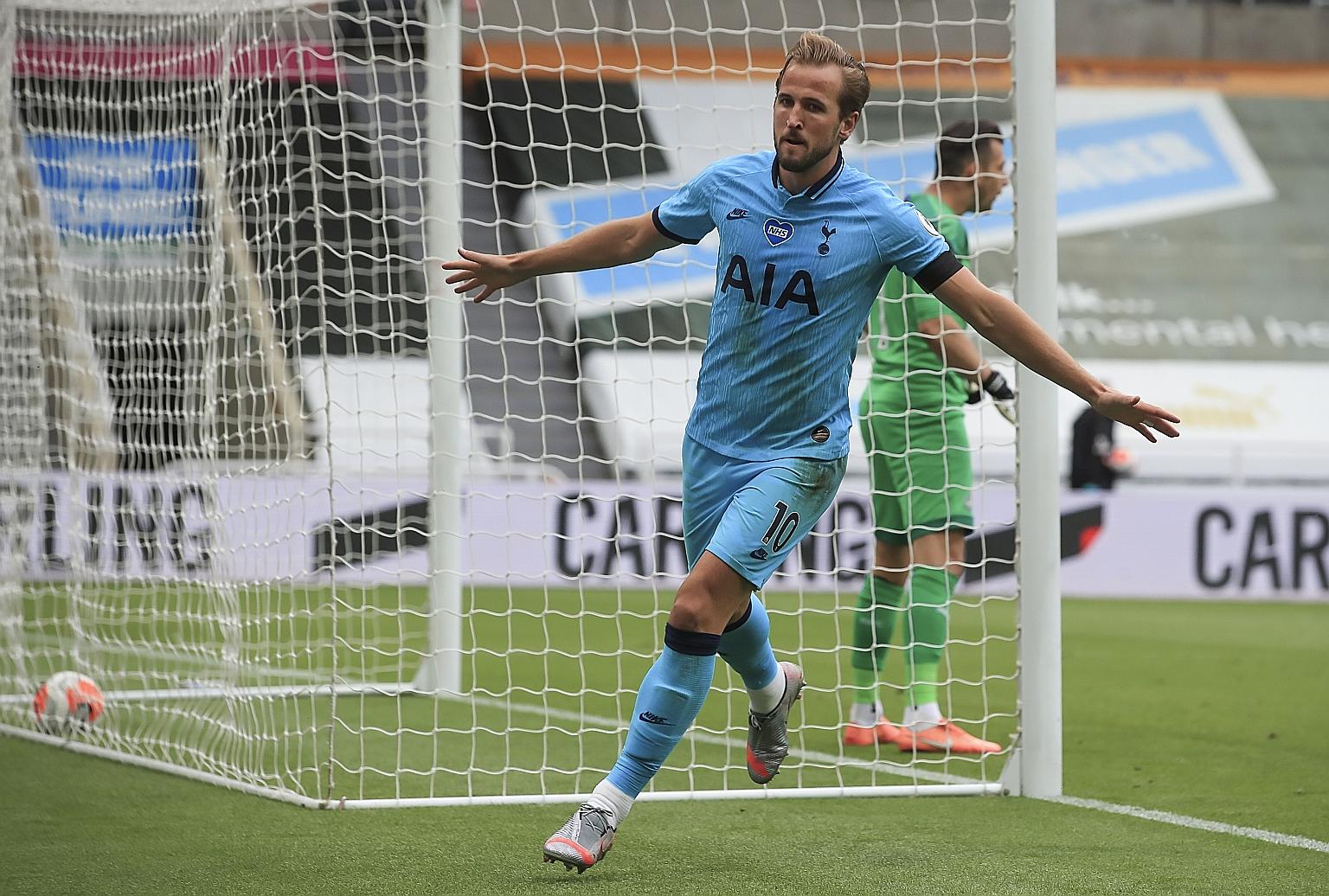 Tottenham star Harry Kane celebrating the first of his two goals against Newcastle on Wednesday. The 3-1 win means Spurs remain just outside the Europa League qualifying spots with two Premier League games left.