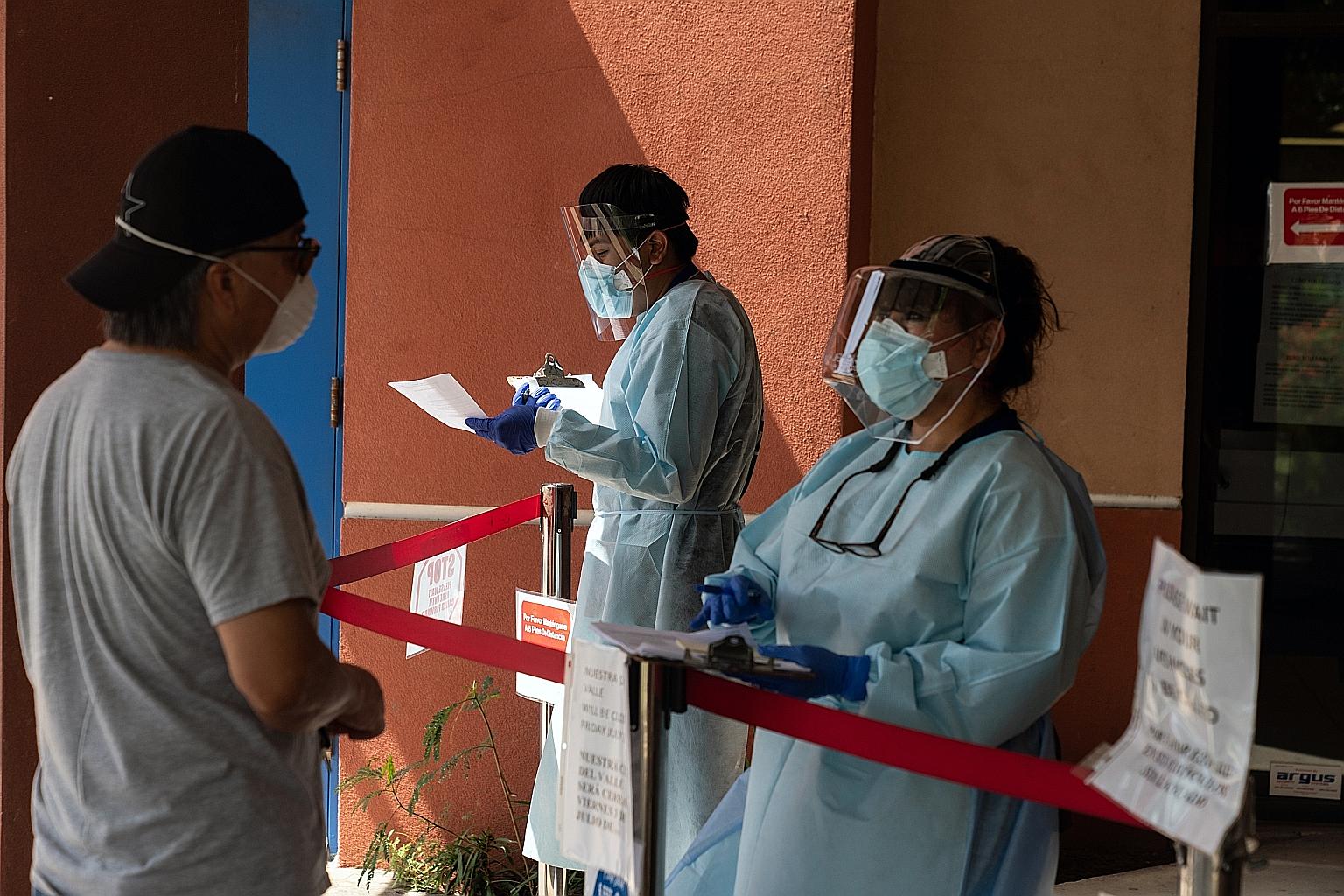 A man being screened before getting tested for Covid-19 at a clinic in San Juan, Texas. The state of Texas on Wednesday reported a record 10,791 new cases and 110 new fatalities.