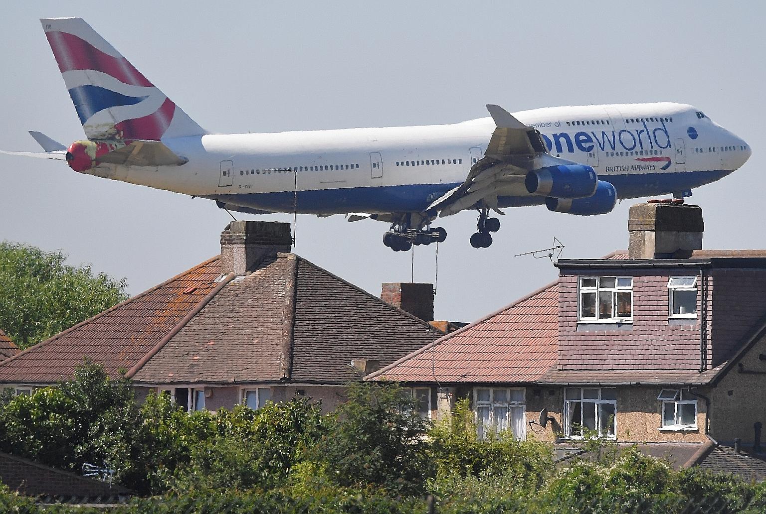 A British Airways Boeing 747-400 approaching Heathrow Airport in London. The Boeing 747, which has fallen behind modern twin-engine aircraft, marked its 50th flying anniversary in February last year. PHOTO: REUTERS