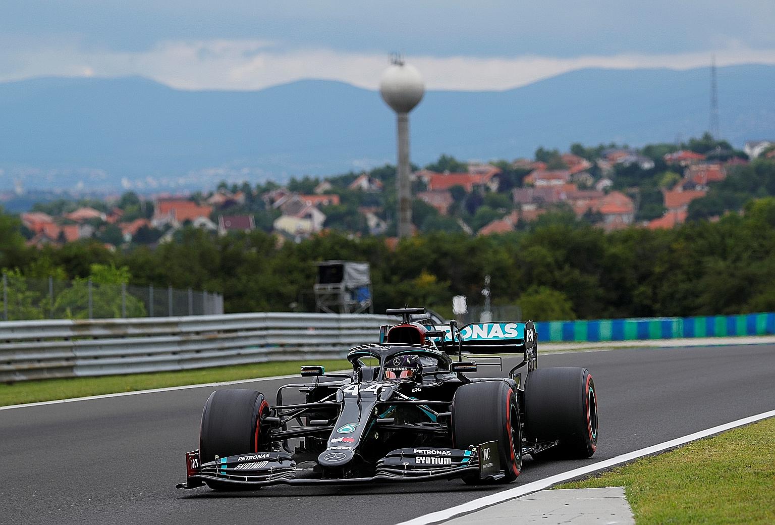 Mercedes' Lewis Hamilton is also aiming to win today's Hungarian Grand Prix for the eighth occasion to equal Michael Schumacher's record for victories at the same grand prix. The Ferrari great won eight times at the French Grand Prix. PHOTO: REUTERS