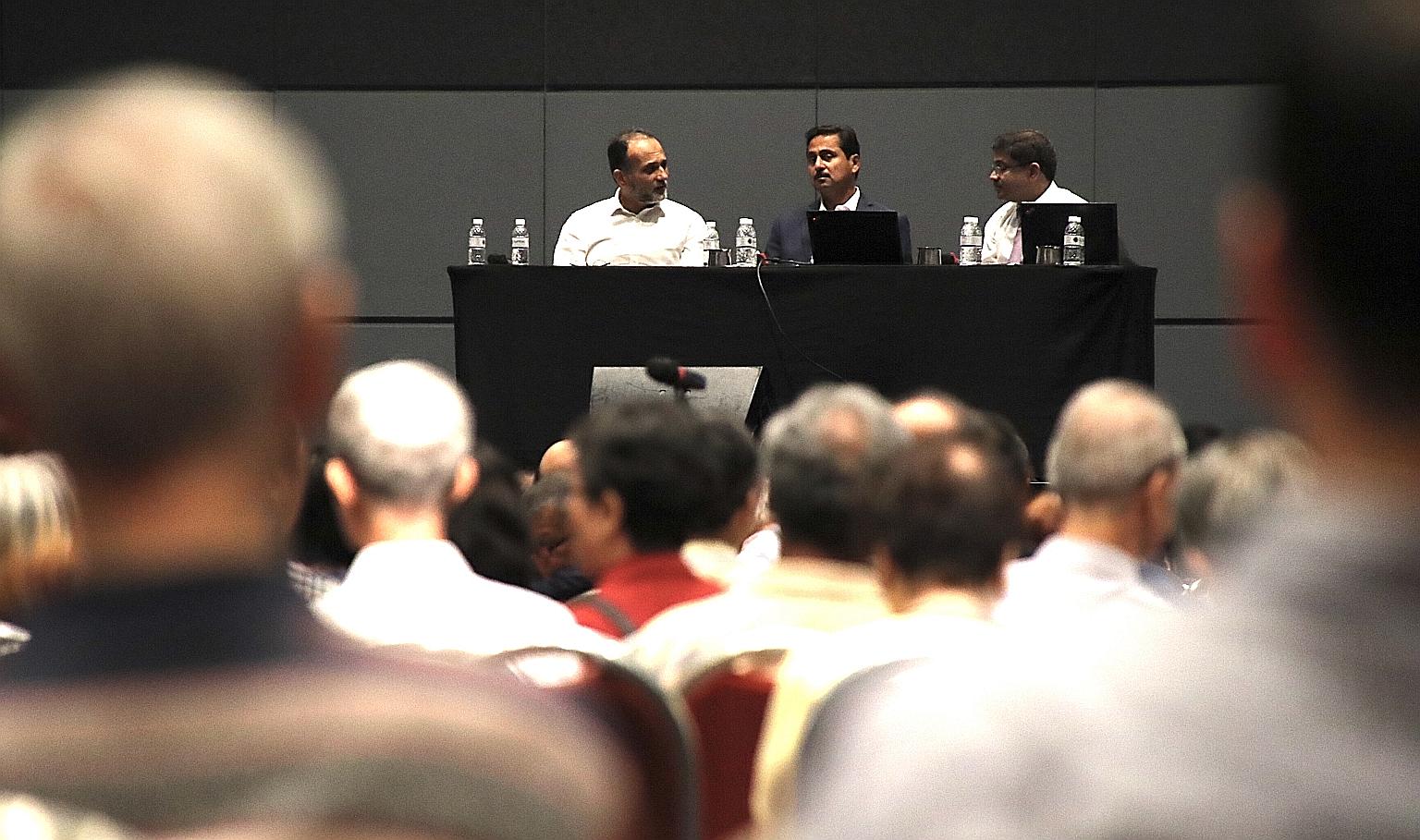 A townhall meeting for investors holding Hyflux's medium-term notes and perpetual securities and preference shares chaired by Utico chief executive Richard Menezes (centre) on Jan 20. 