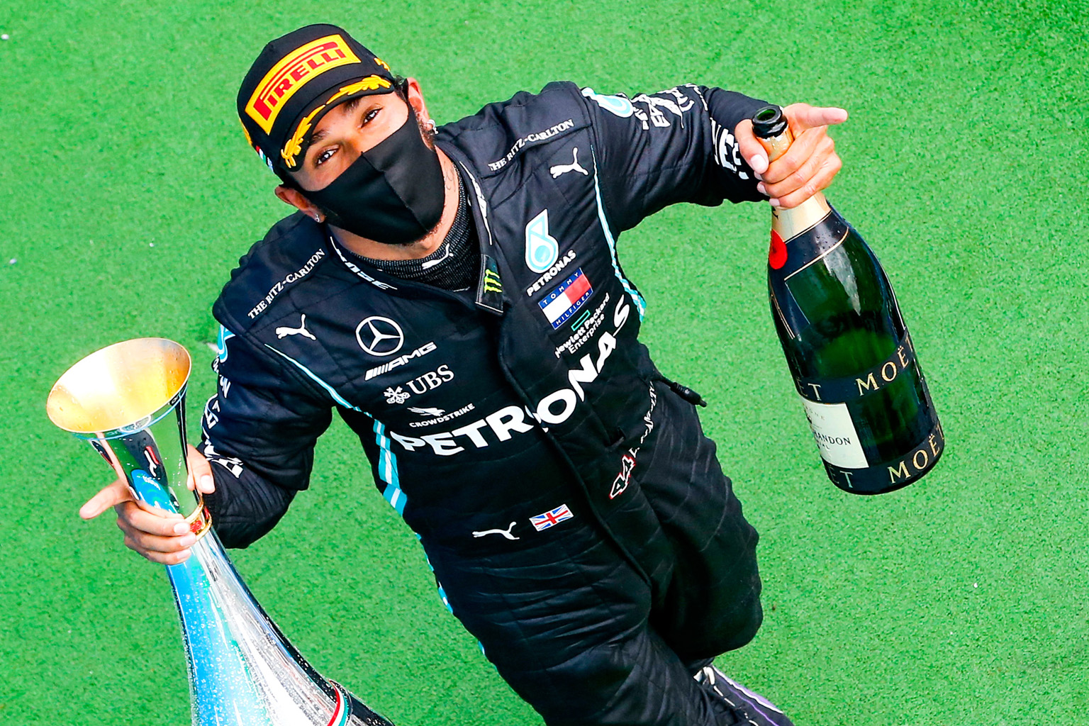 Lewis Hamilton with the victor's spoils of a trophy and champagne after winning the Hungarian Grand Prix on Sunday. With two wins from three races, the reigning world champion leads Mercedes teammate Valtteri Bottas by five points in the drivers' sta