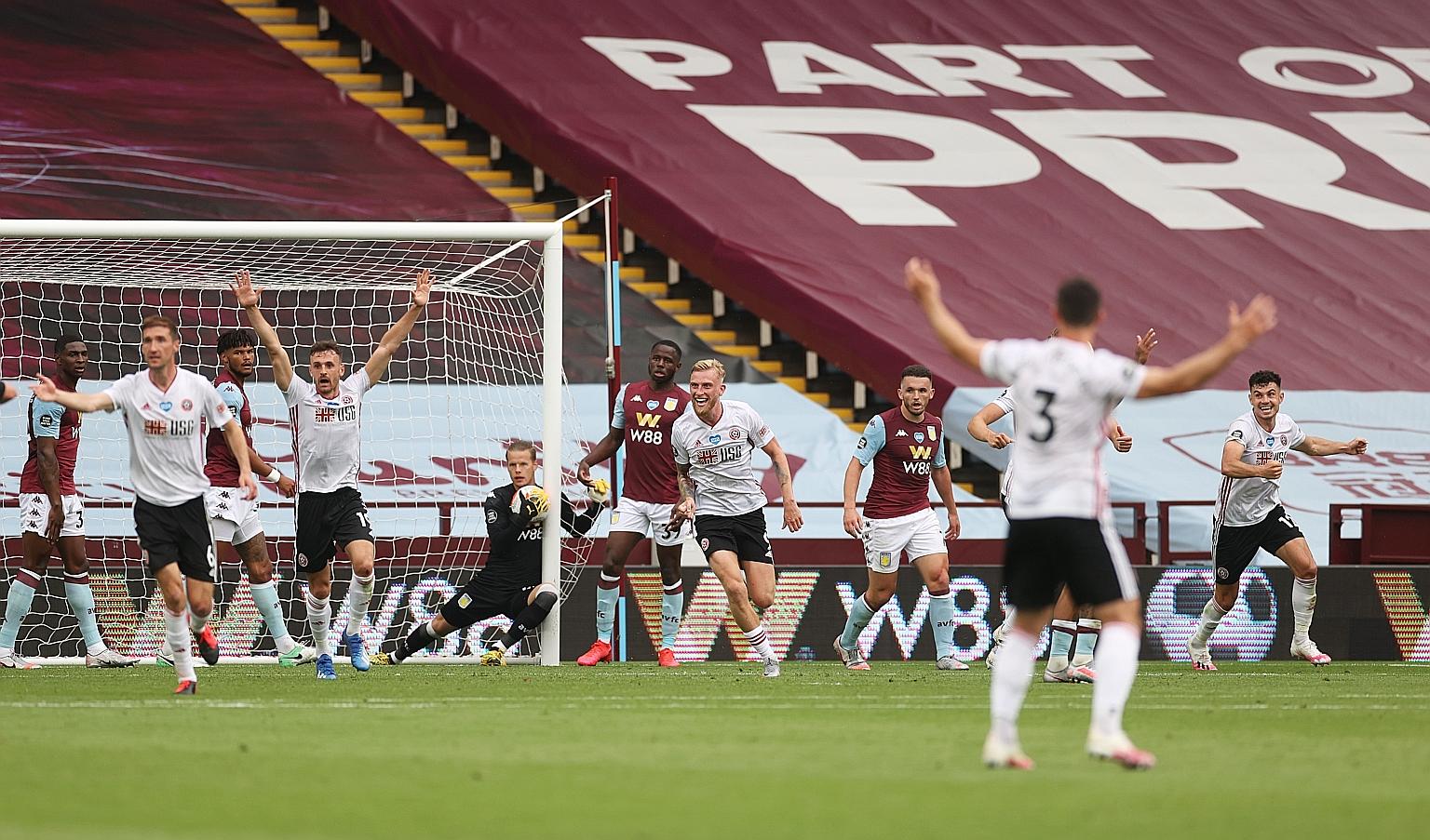 Sheffield United celebrating a goal against Villa prematurely on June 17. Goal-line technology failed to work and VAR could not intervene. 