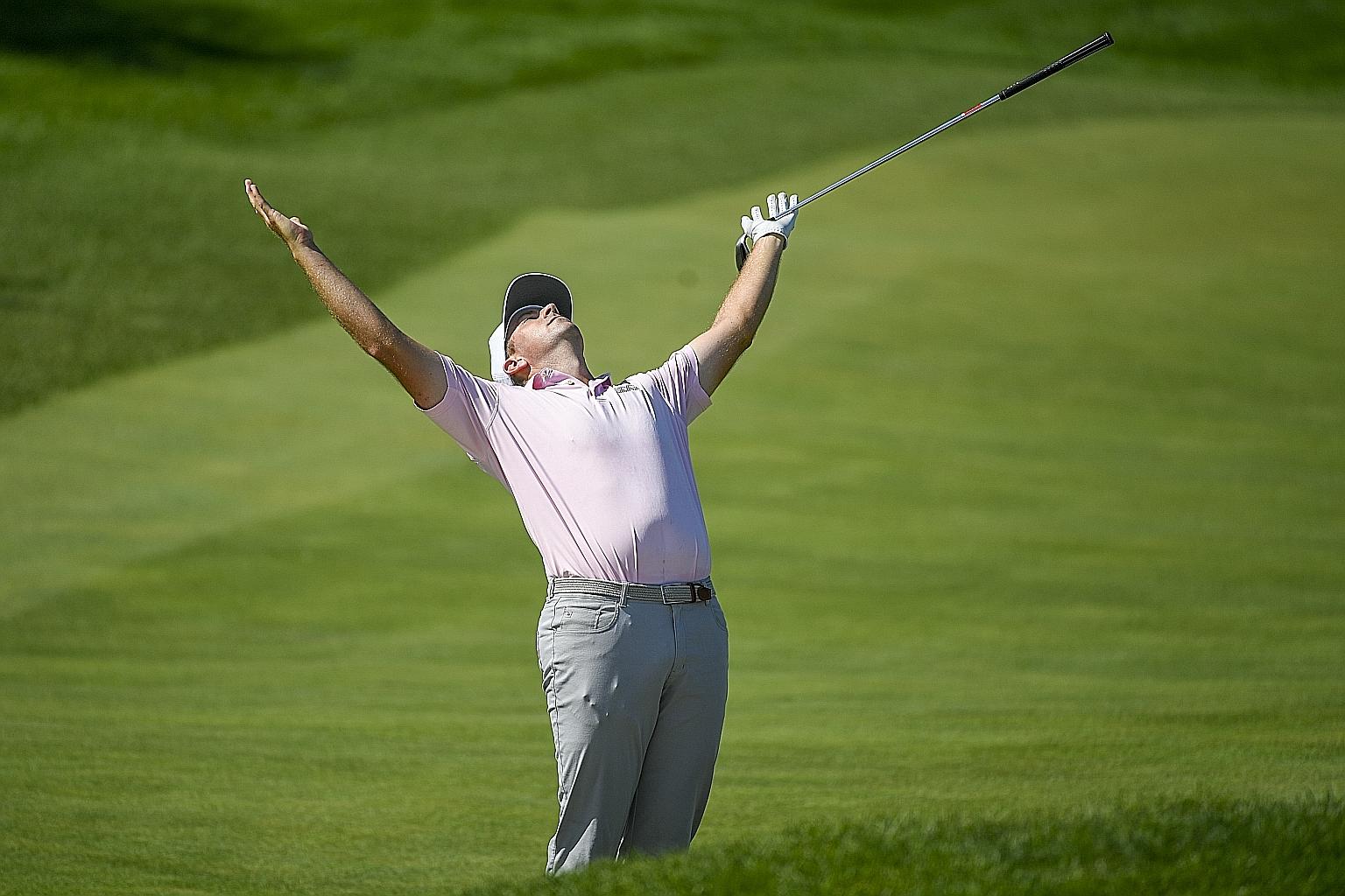 Michael Thompson is ecstatic after holing out from 80 feet for a birdie on the 14th hole during the second round of the 3M Open at the TPC Twin Cities course in Blaine, Minnesota. He and Richy Werenski held the 36-hole lead at 12-under 130. PHOTO: EP