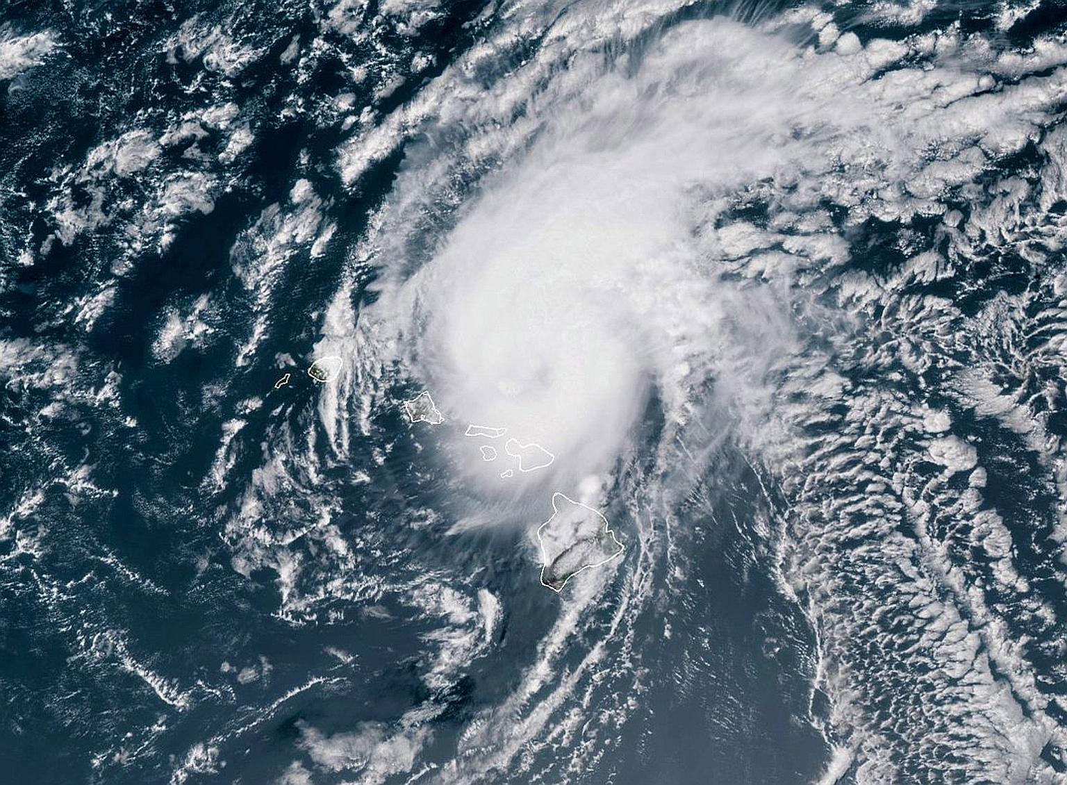 A satellite image showing Hurricane Douglas moving towards the west-north-west of Hawaii. If Douglas reaches the islands, it would be only the third hurricane in modern times to do so. The storm was expected to pass near the islands of Oahu and Kauai