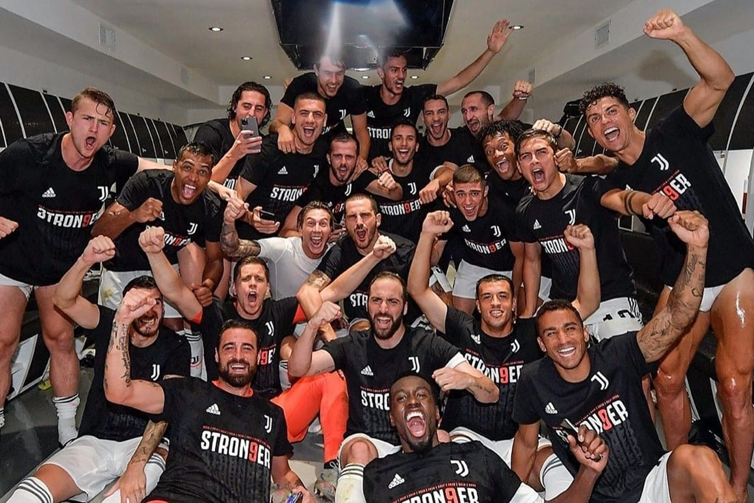 Juventus players pose for a celebratory photo in the dressing room after their 2-0 win over Sampdoria that sealed their ninth straight Serie A title. PHOTO: INSTAGRAM/ JUVENTUS