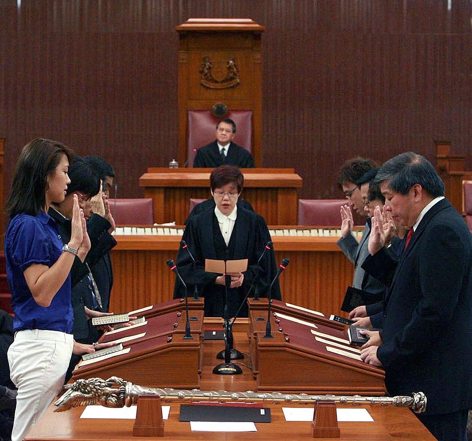 Nominated Members of Parliament at their swearing-in ceremony on July 20, 2009. Each NMP serves a term of 21/2 years and may be reappointed. PHOTO: MICA