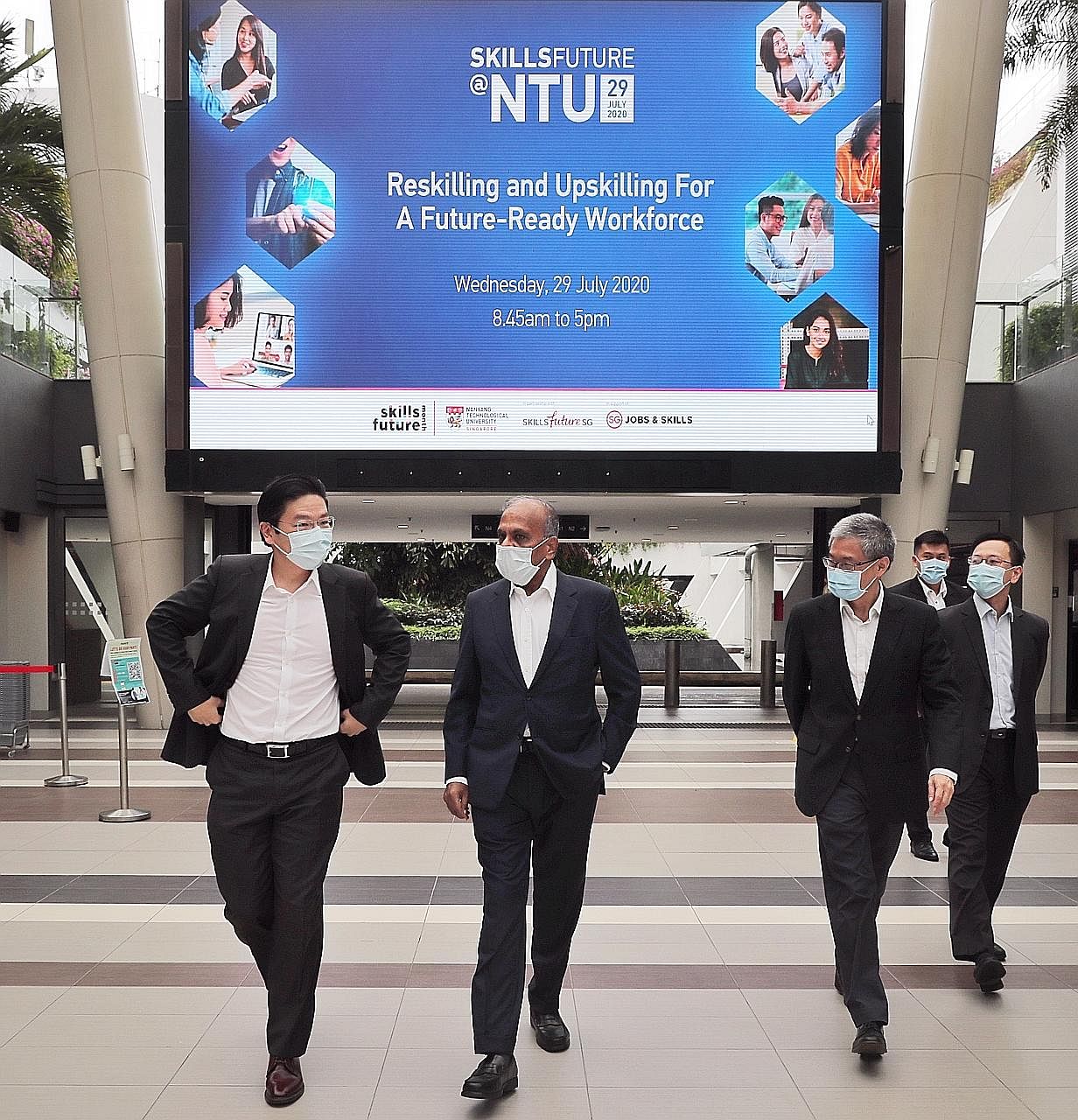 (From left) Education Minister Lawrence Wong, Nanyang Technological University (NTU) president Subra Suresh, NTU deputy president and provost Ling San, and other guests arriving at SkillsFuture@NTU yesterday. ST PHOTO: GAVIN FOO