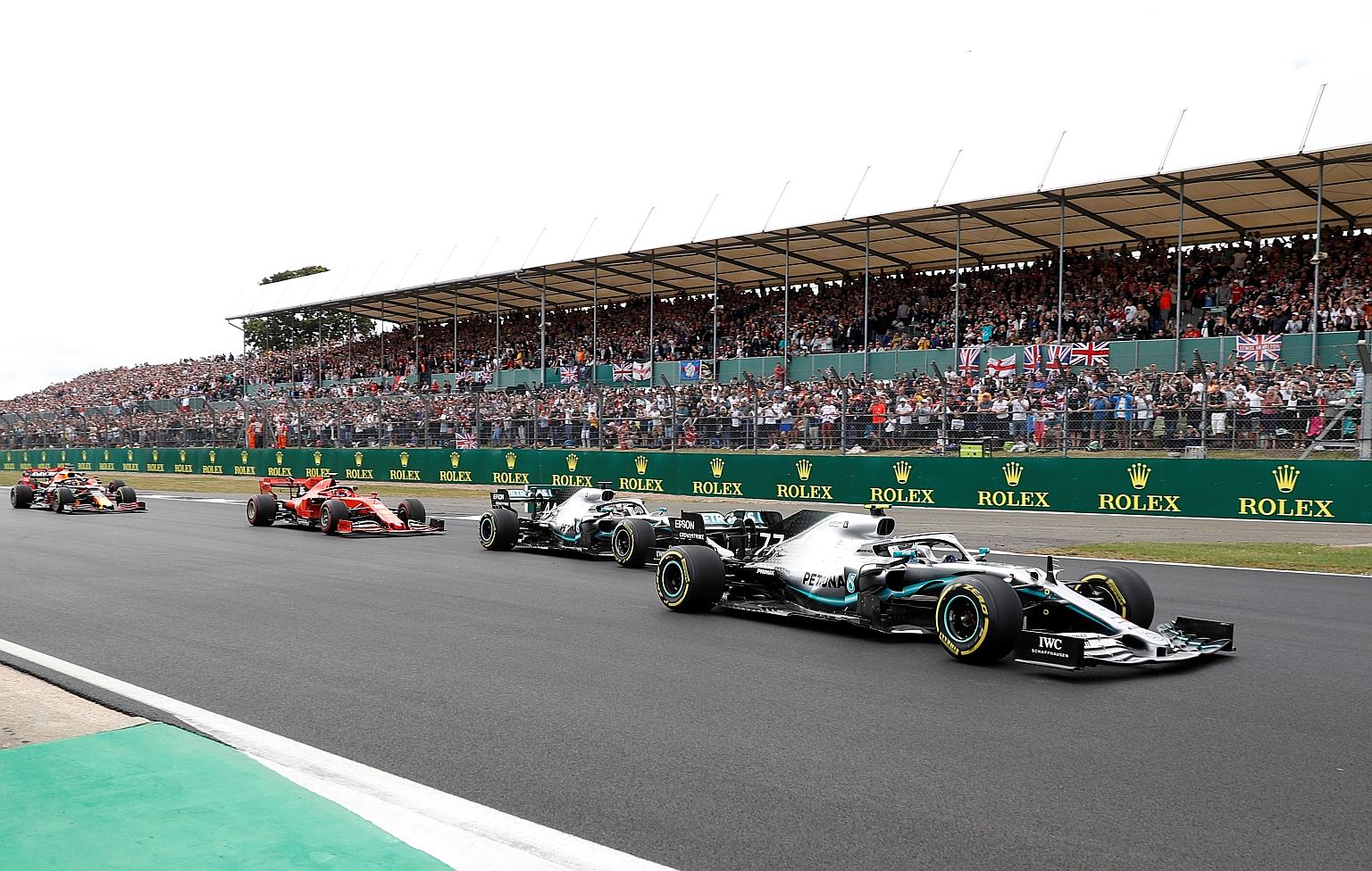 Fans cheering on Lewis Hamilton as the Briton chased Mercedes teammate Valtteri Bottas before claiming a sixth British Grand Prix win last year. He is seeking a record extending seventh victory on Sunday.