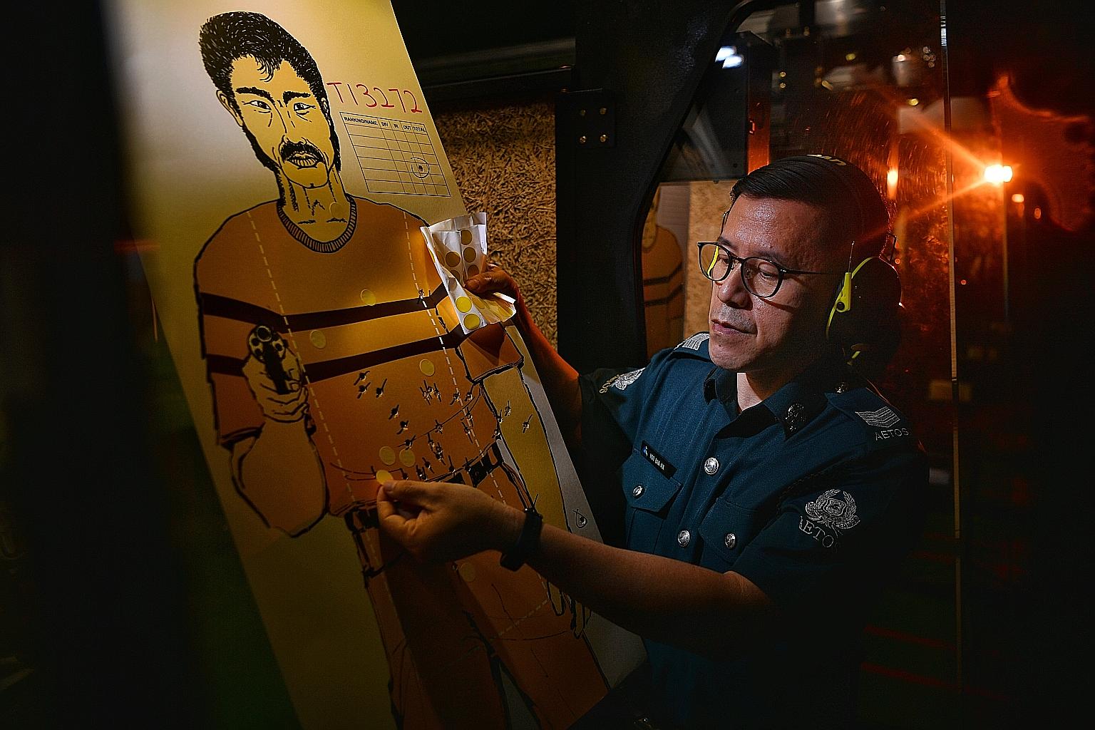 Sergeant Hoo Ban Aik at the shooting range. He made the switch from his previous engineering job in the semiconductor industry to working on the security team at the Institute of Mental Health after taking up the PCP for Auxiliary Police Officer (Arm