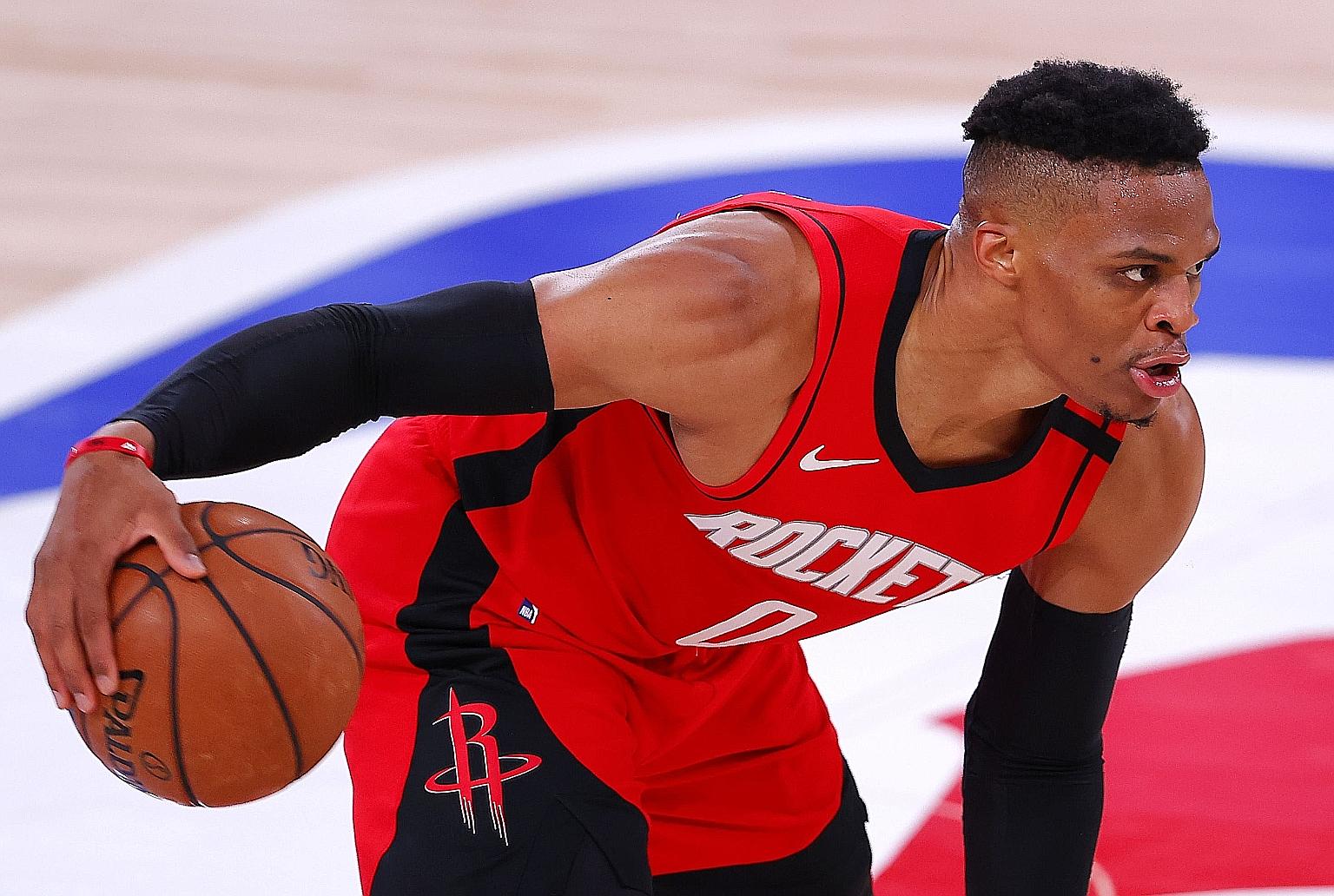 Milwaukee forward Giannis Antetokounmpo trying to get past Houston's Robert Covington during the Bucks' 120-116 loss in Florida. The Greek big man recorded game-high points (36), rebounds (18) and assists (eight).