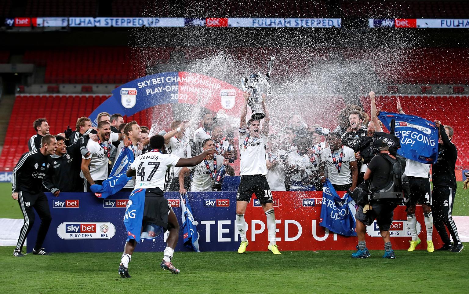 Fulham celebrating after beating London rivals Brentford 2-1 in the Championship play-off final behind closed doors at Wembley on Tuesday.