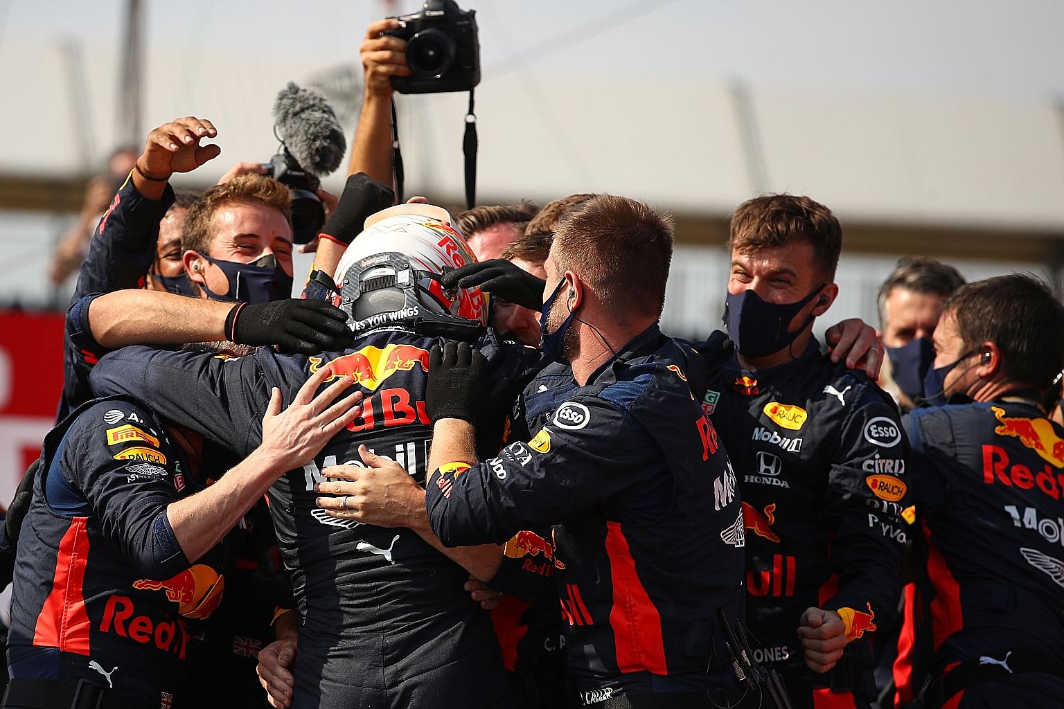 Max Verstappen celebrates an unlikely victory at Formula One's 70th Anniversary Grand Prix with his Red Bull crew. The 22-year-old Dutchman had never won at Silverstone and started fourth on the grid but still managed to end Mercedes' unbeaten start 