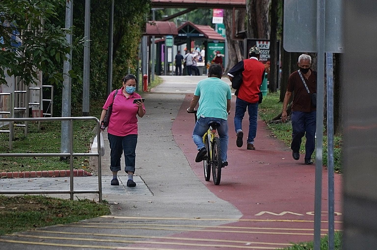 One advisory in the new pedestrian code of conduct says pedestrians should stay alert and refrain from using their mobile devices in a way that will hinder their ability to detect danger.