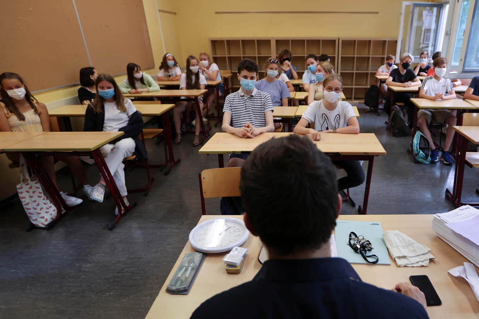 Pupils of German high school Zum Grauen Kloster in Berlin wearing face masks during their lesson yesterday. There has been public debate in Germany over whether children should have to wear masks in school.