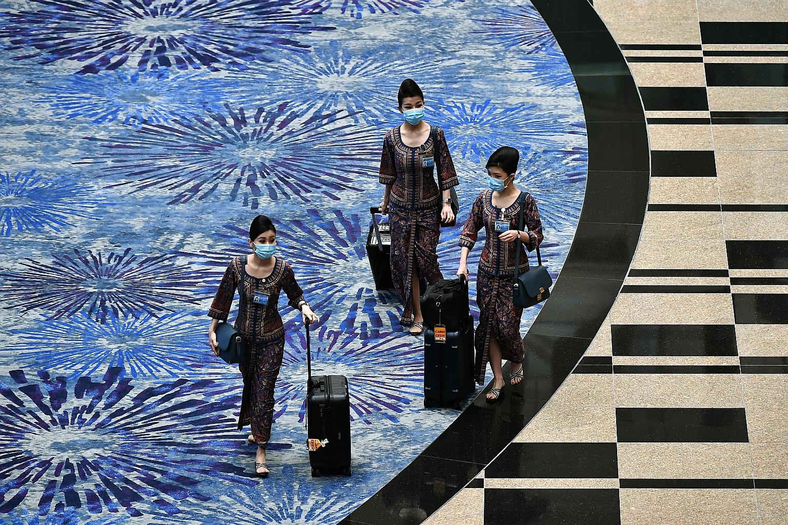 Three groups of Singapore Airlines and SilkAir cabin crew are eligible to apply for the early retirement and release scheme - those still serving their bond as of Aug 1, those in the last year of their current contract, and male crew on tenure. ST PH