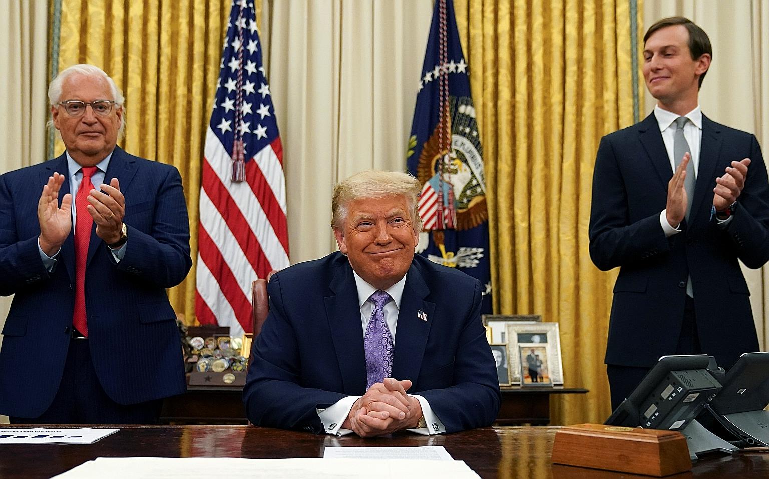 Israeli Prime Minister Benjamin Netanyahu (top) and Abu Dhabi's Crown Prince Sheikh Mohammed Bin Zayed both took to Twitter to hail the peace deal. US Ambassador to Israel David Melech Friedman (left) and White House senior adviser Jared Kushner appl