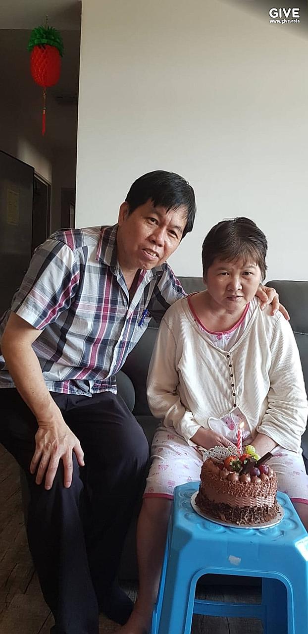 Madam Ang Liu Kiow, seen with her husband Leong Loon Wah, was hit by an electric scooter in 2016. She is now unable to speak, read or write, and needs help with eating, dressing and using the bathroom. Doctors do not expect her to recover further fro