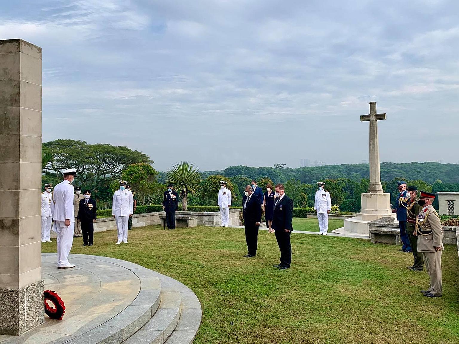 A private ceremony at Kranji War Cemetery yesterday remembering Singapore veterans and Allied soldiers who fought against the Japanese in South-east Asia in World War II. A minute of silence was held. PHOTO: UKINSG/FACEBOOK