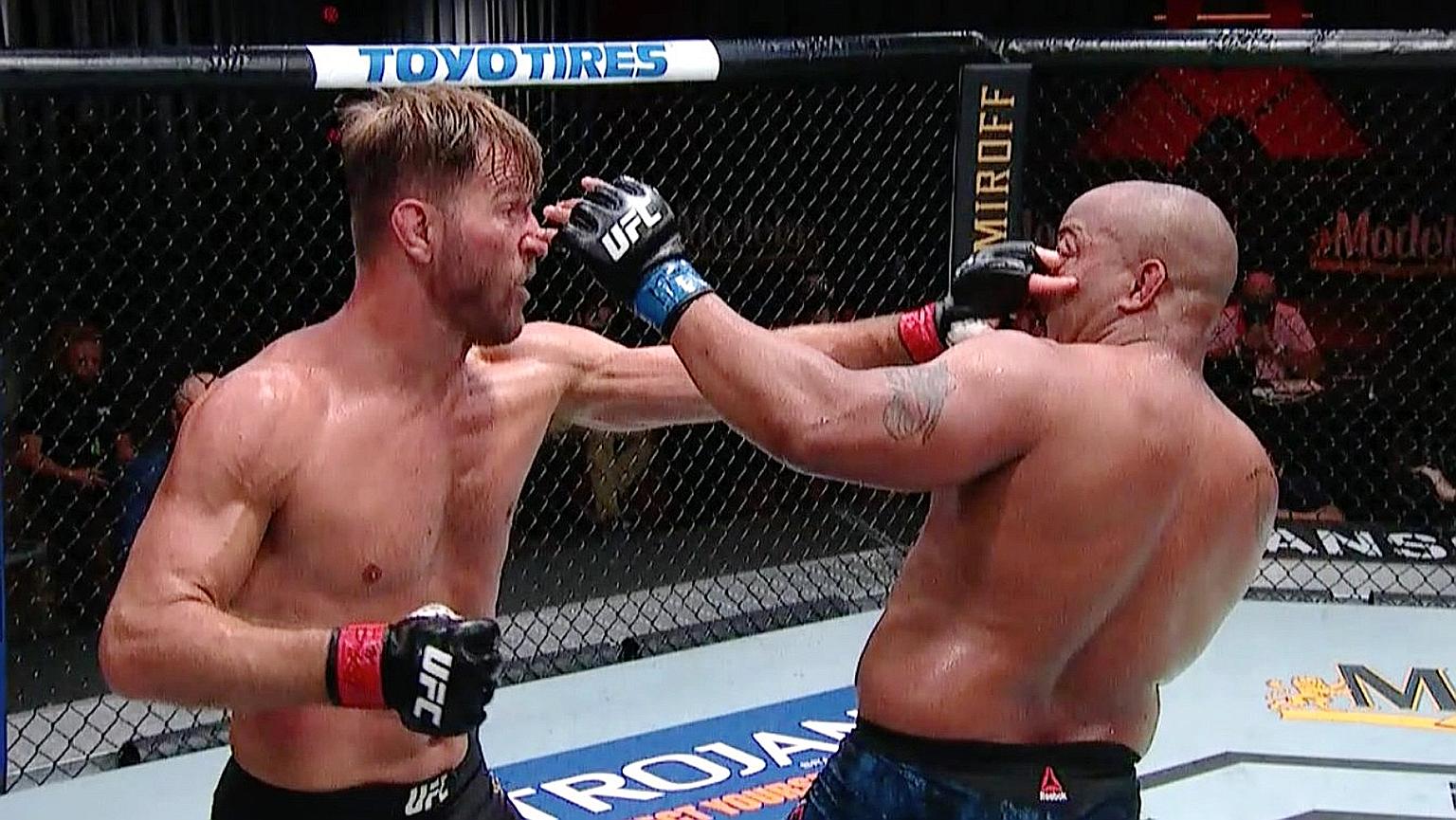 Stipe Miocic poking Daniel Cormier in the eye in the third round of the main fight of UFC 252 in Las Vegas on Saturday. The former Ultimate Fighting Championship (UFC) light heavyweight and heavyweight champion confirmed that he was retiring at age 4