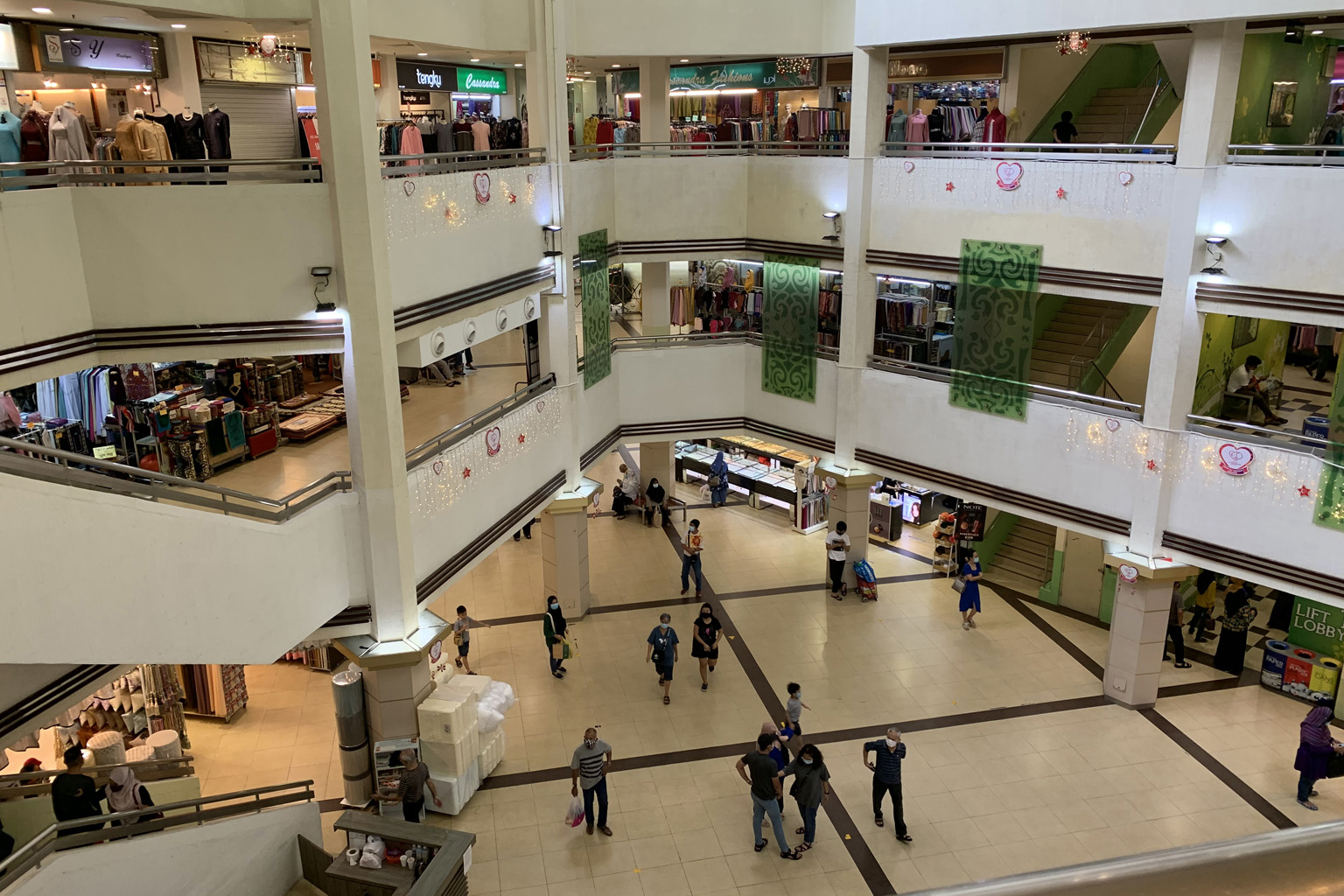 Joo Chiat Complex, which is usually crowded during the weekends, has been unusually quiet during the coronavirus pandemic. Shopkeepers said that unless the situation changes, it would be difficult to maintain their businesses. PHOTO: NUR HUMAIRA SAJA