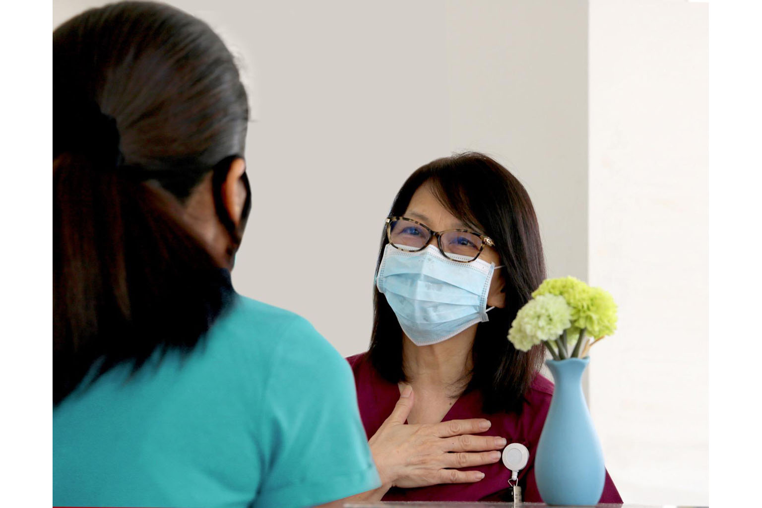 Alexandra Hospital's medical social worker Eleanor Lee with Ms Vahani (not her real name), an abuse victim. PHOTO: ALEXANDRA HOSPITAL
