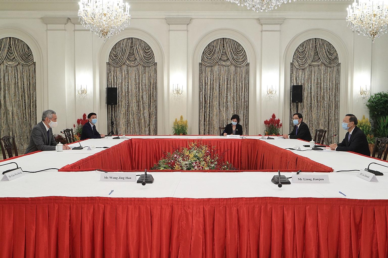Prime Minister Lee Hsien Loong meeting Mr Yang Jiechi (right), who is a member of the Politburo and heads the Chinese Communist Party's foreign affairs office, yesterday at the Istana. They reaffirmed the importance of strengthening cooperation in a 