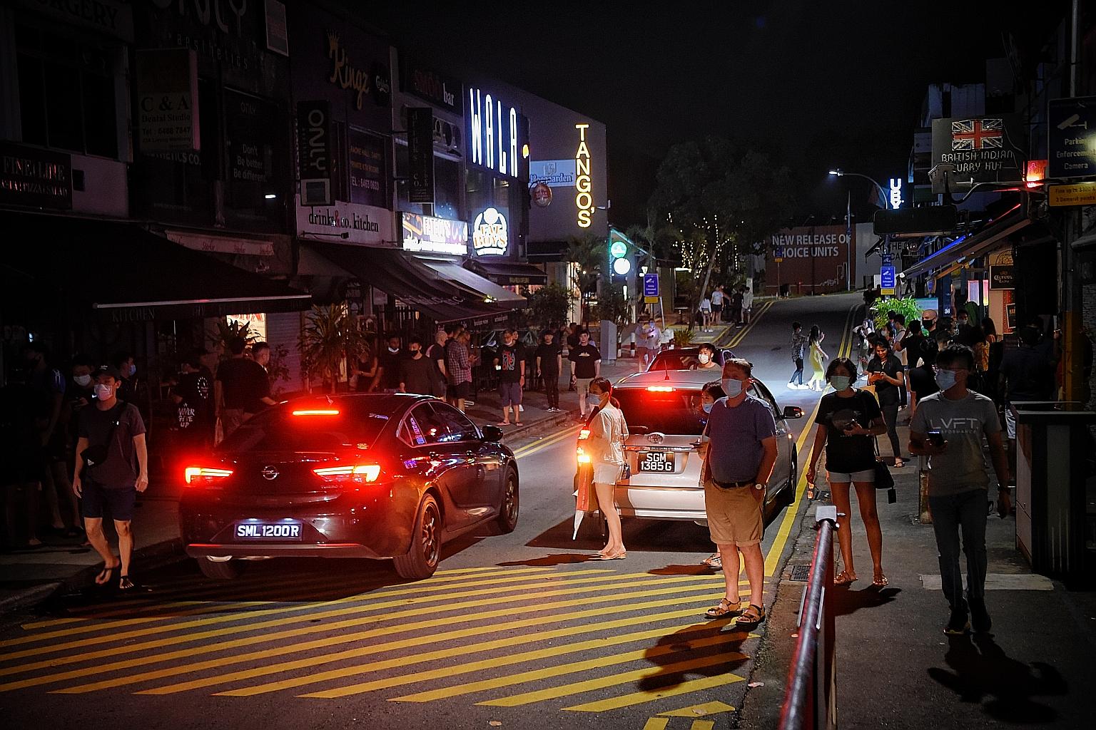 Lorong Mambong, which has popular eateries, was busy last night. Food and beverage outlets still find some customers attempting to bend social distancing rules limiting the size of groups dining out.