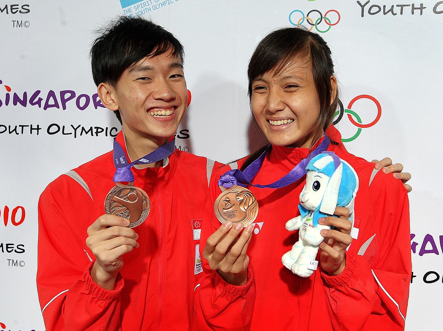 Taekwondo exponents Daryl Tan and Shafinas Abdul Rahman, who each won a bronze in the 55kg category of the 2010 Youth Olympics, are no longer active in the sport. ST FILE PHOTO