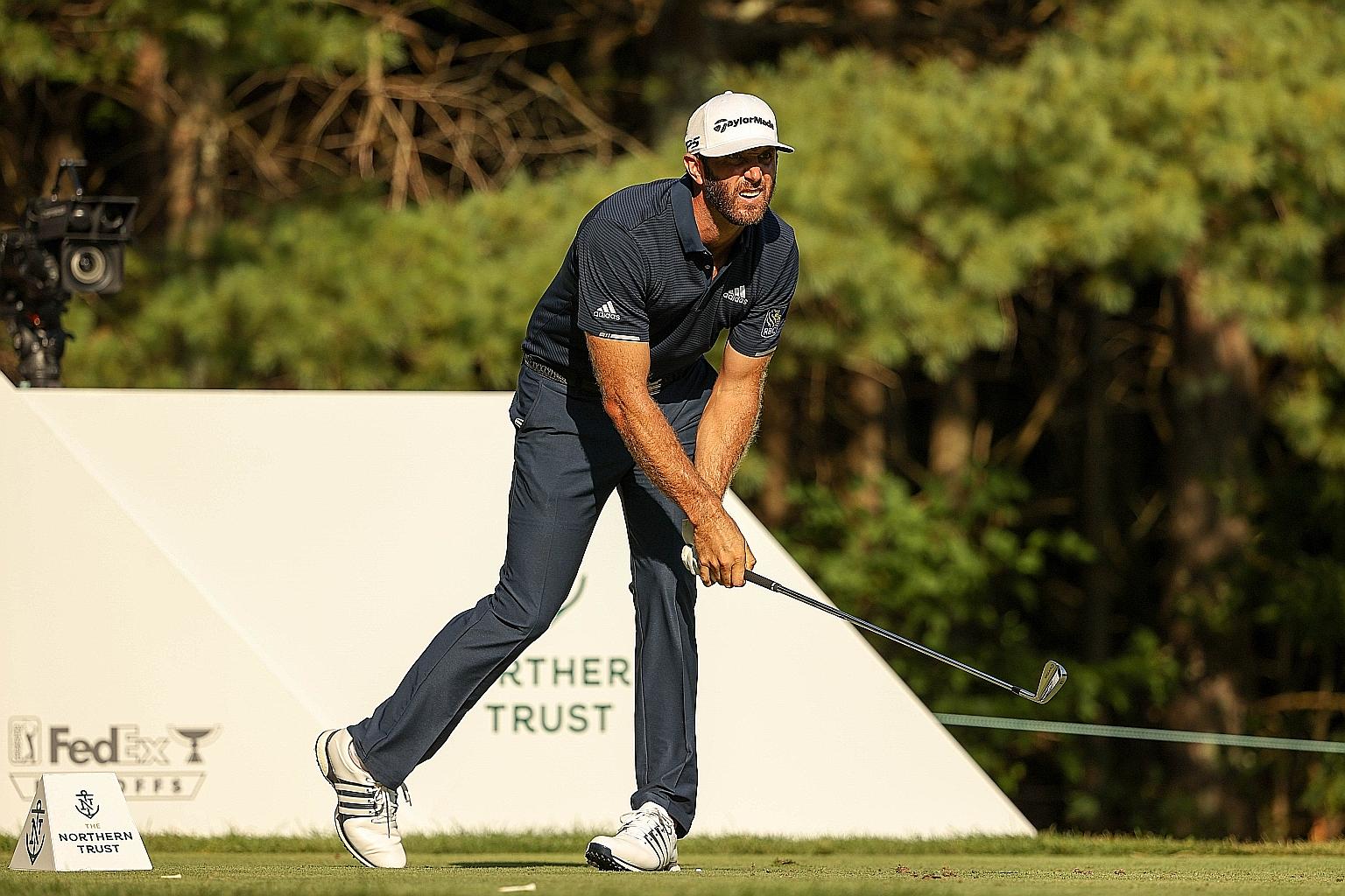 American Dustin Johnson watching his shot on the 11th tee during the final round of The Northern Trust at TPC Boston. PHOTO: AGENCE FRANCE-PRESSE