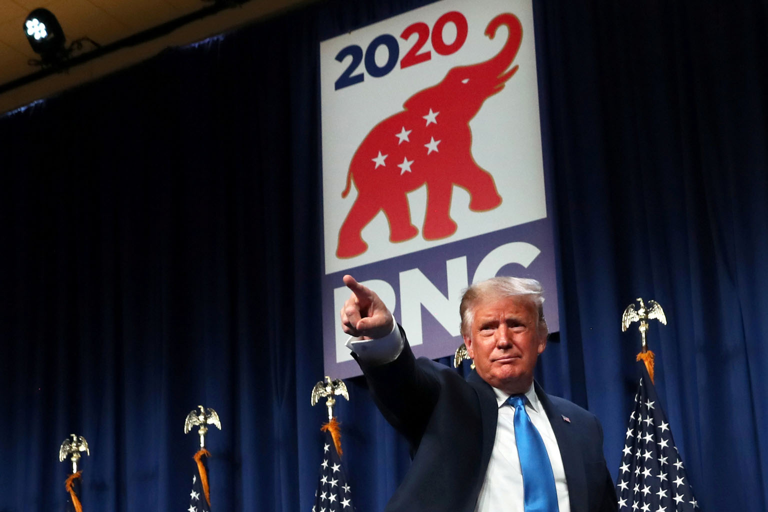US President Donald Trump gesturing to the gathered delegates after his address on the first day of the Republican National Convention in Charlotte on Monday. After formally securing the delegates' nomination for another term, Mr Trump claimed withou