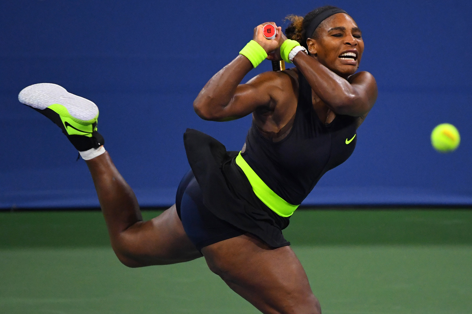 Serena Williams making a return to Greek Maria Sakkari during their last-16 match at the Western and Southern Open in New York on Tuesday. The American admitted she was suffering from cramps in the later stages of her 5-7, 7-6 (7-5), 6-1 loss. PHOTO: