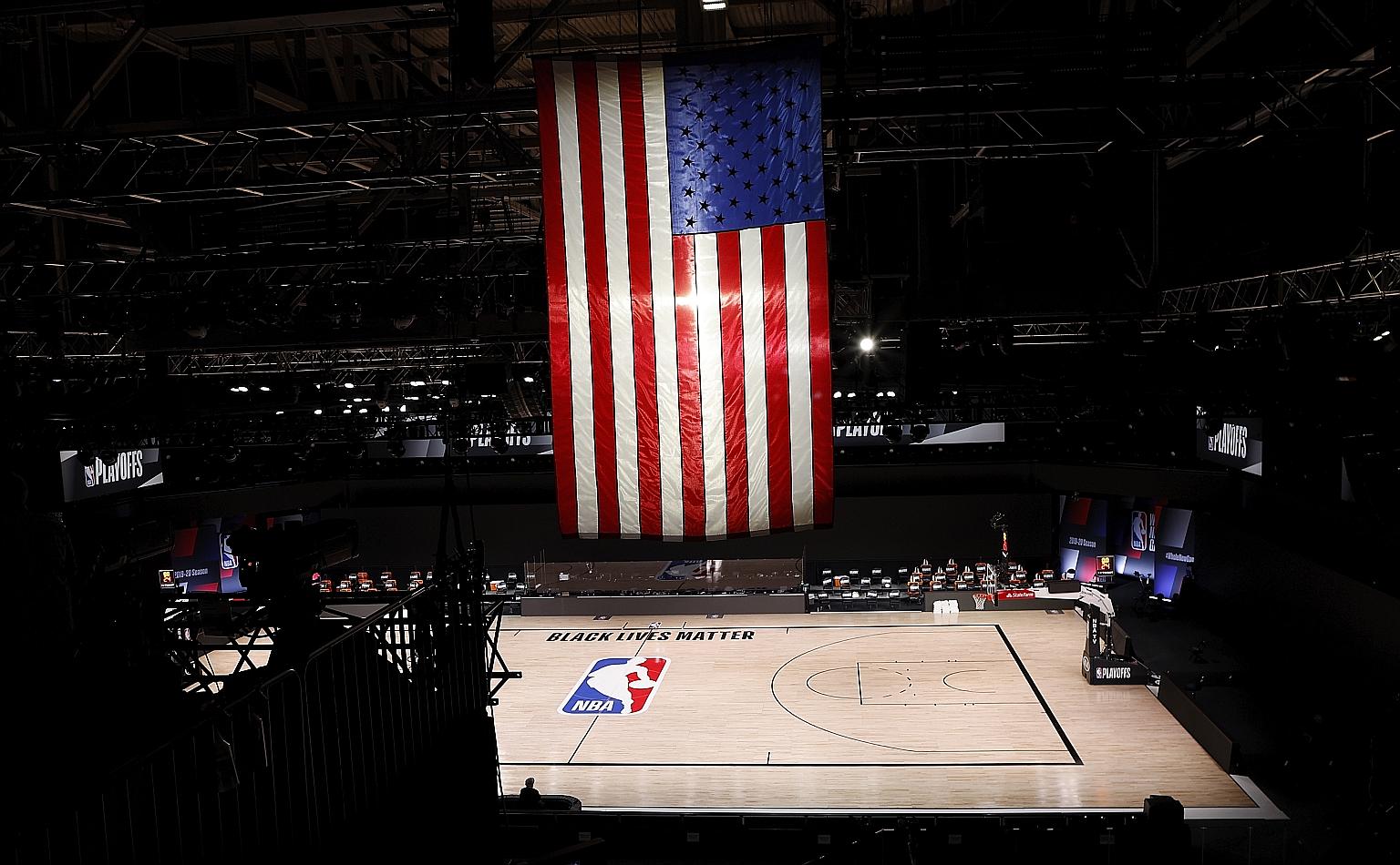 The court remains empty at the ESPN Wide World of Sports Complex near Orlando on Wednesday. The Milwaukee Bucks had refused to come out of their locker room for Game 5 of their play-off series against the Orlando Magic. PHOTO: EPA-EFE