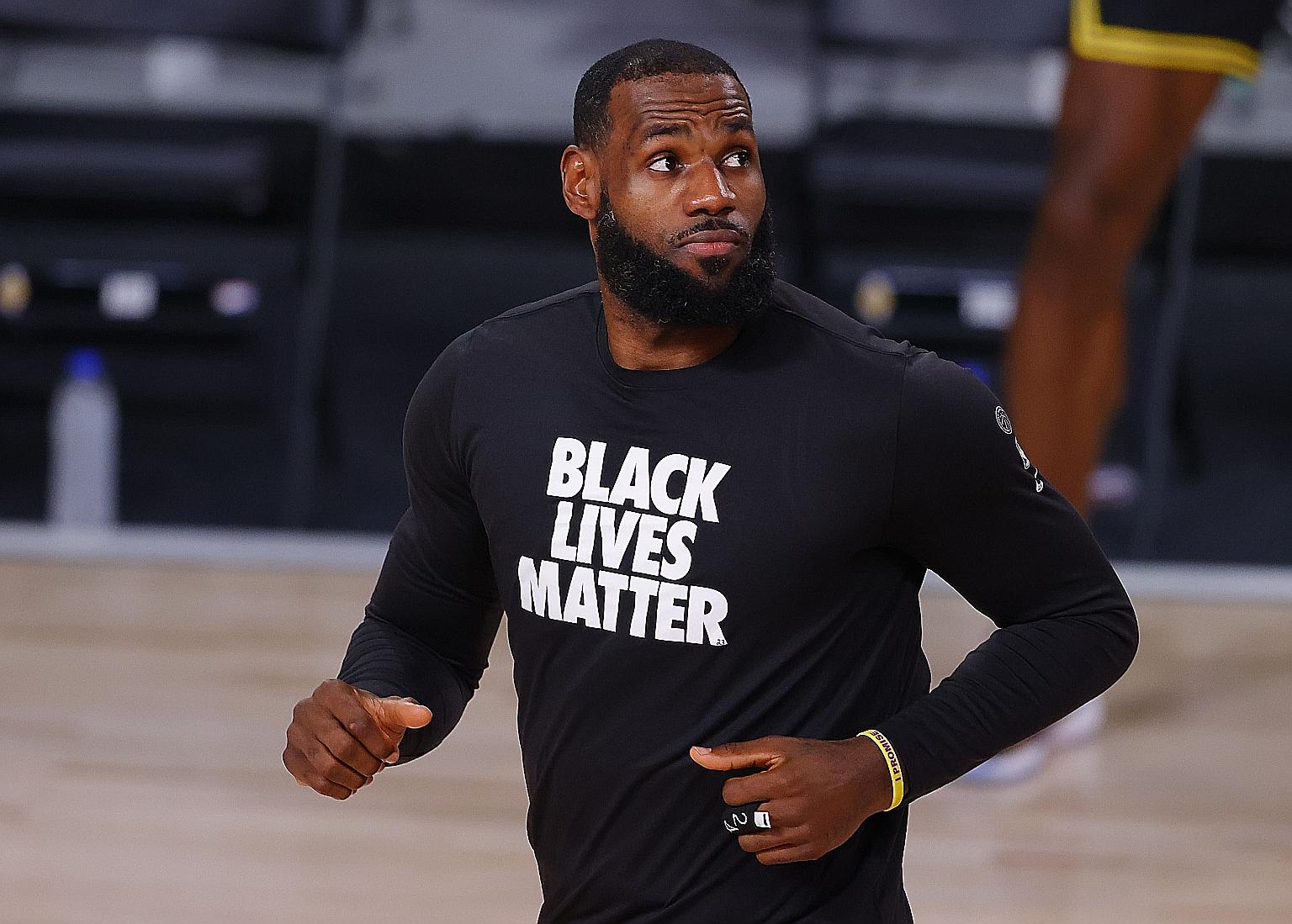 NBA players reportedly agreed on Thursday to continue the play-offs, with LeBron James (above) and the Los Angeles Lakers "on board" with the decision. PHOTO: AGENCE FRANCE-PRESSE