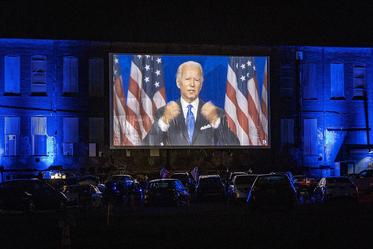 US presidential hopeful Joe Biden shown at the Democratic National Convention at a drive-in event in Pennsylvania earlier this month. Republican stalwarts have endorsed him in prime-time speeches at the convention.