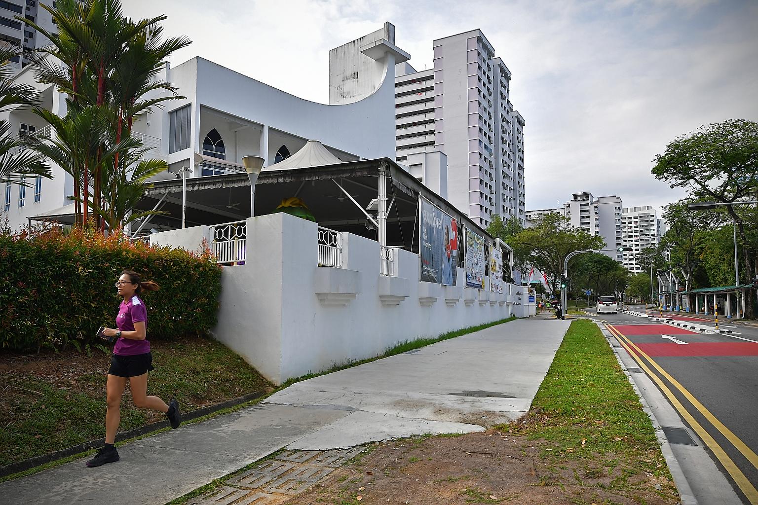 A cycling path being built outside Covenant Evangelical Free Church in Jelapang Road. In heartland areas, the authorities have taken away road space for cycling paths in certain places, for instance, at a 100m stretch along Jelapang Road in Bukit Pan