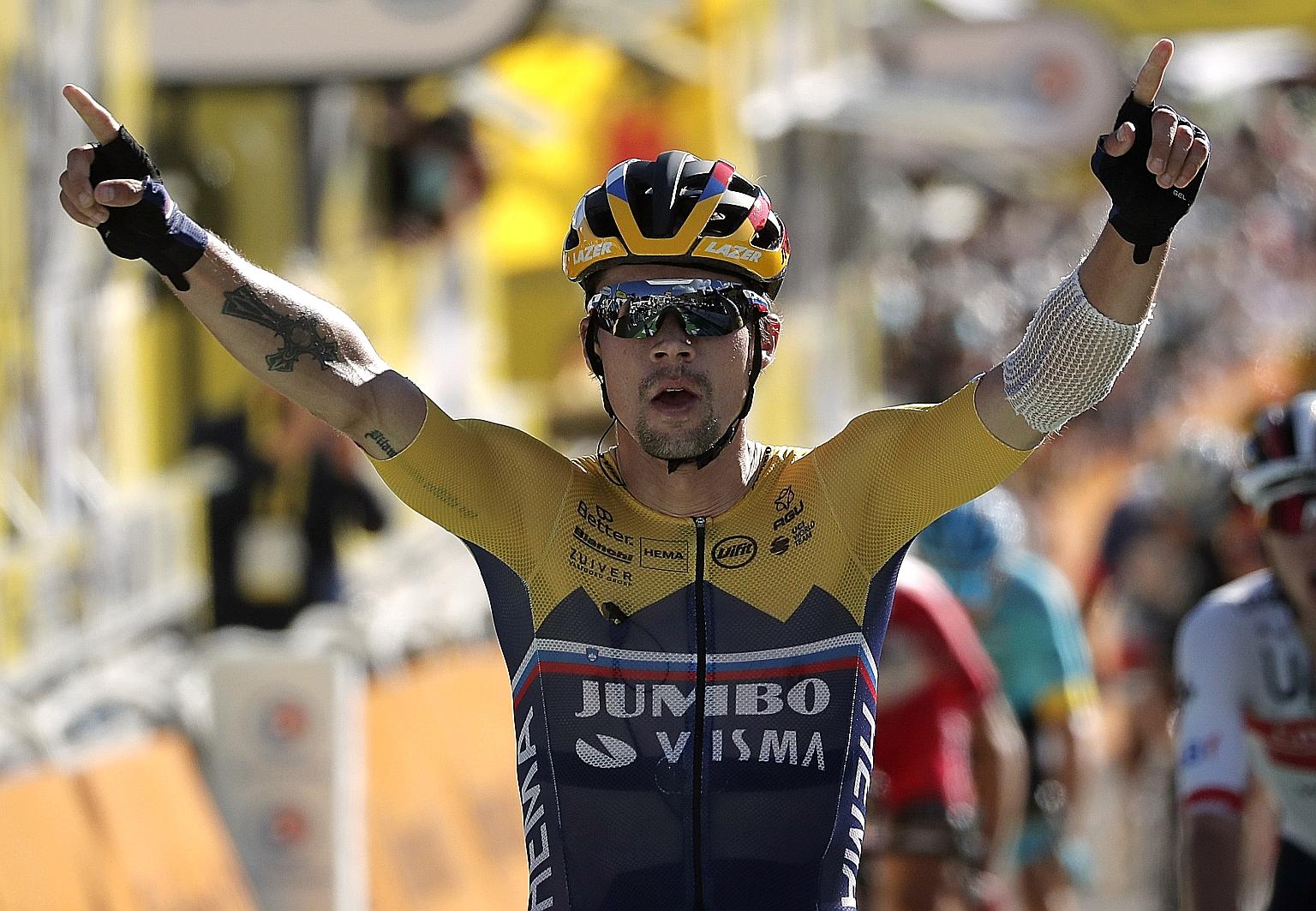 Team Jumbo-Visma's Primoz Roglic celebrating after his stage win. PHOTO: REUTERS
