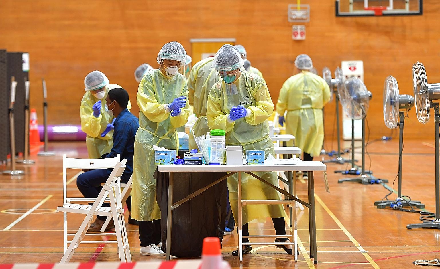 A regional screening centre set up at Bukit Gombak Sports Hall. In his Parliament speech, Prime Minister Lee Hsien Loong paid tribute to the "heroic efforts of many unsung heroes" involved in the Covid-19 fight. He also said that critical to the succ
