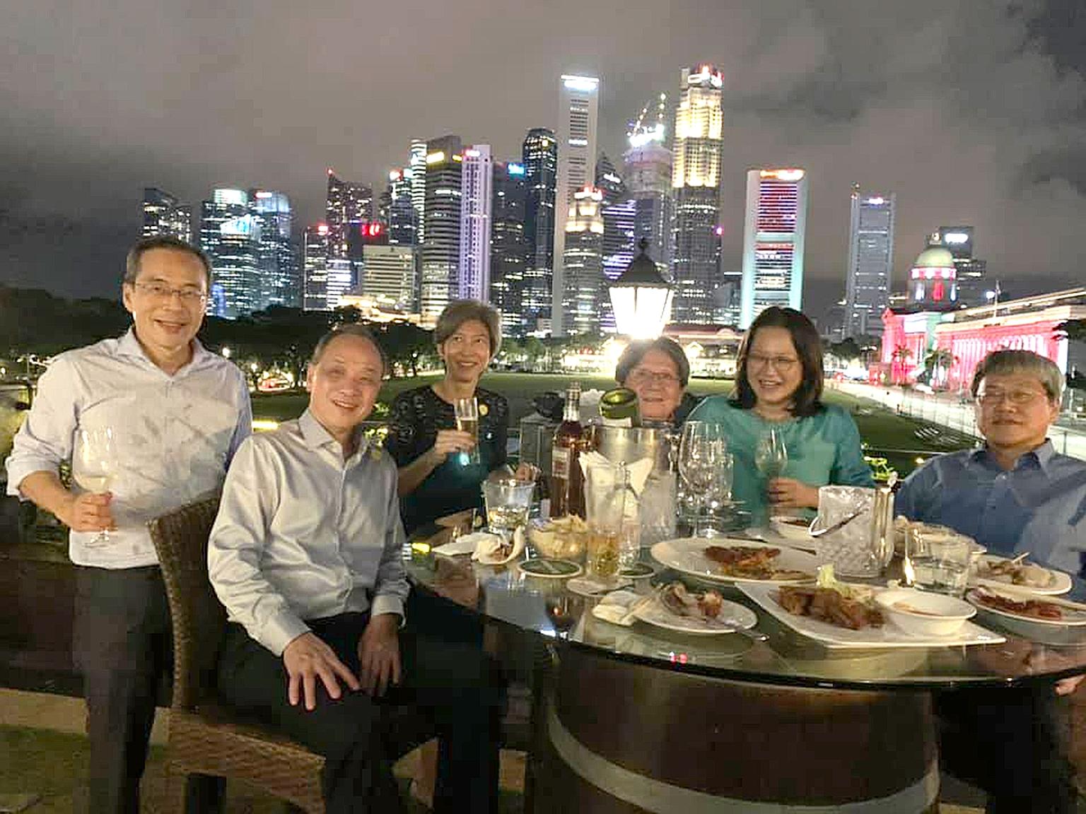 A picture posted last week by Workers' Party MP Sylvia Lim (second from right) of her having dinner with party colleagues at a rooftop bar near City Hall. She had written: "Wow, what a skyline." With Ms Lim are (from left) Hougang MP Dennis Tan, form