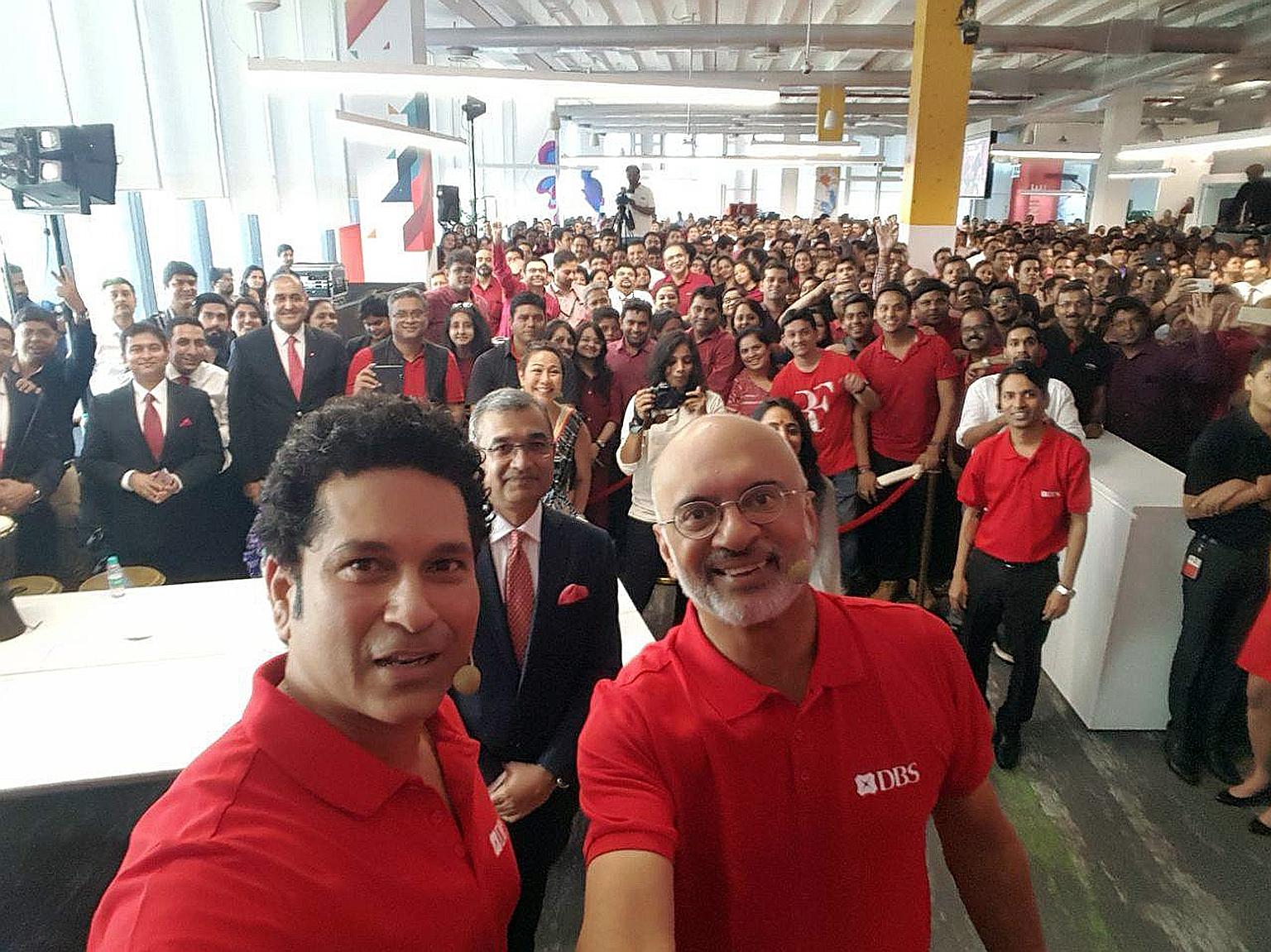 A 2017 wefie of DBS Bank chief executive Piyush Gupta (right, foreground) with employees in India, where the bank had opened a new office. Prime Minister Lee Hsien Loong noted how the photo was posted online to suggest that the bank was favouring for