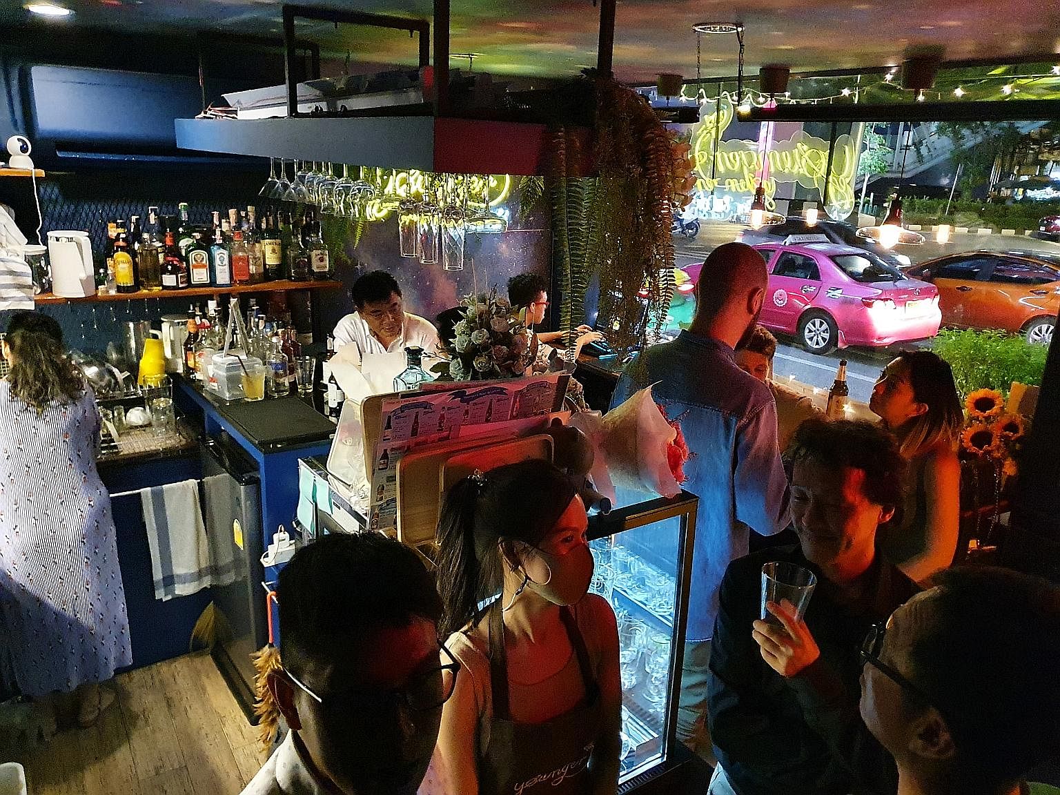 Bangkok's Younger Bar and Cafe, which normally caters to expatriates, had to retrench three staff members and stop serving food to survive. ST PHOTO: TAN HUI YEE