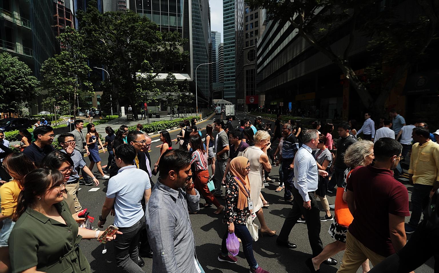 The lunch crowd in the CBD in January. For a nation that needs to be a global city to remain relevant, and also a home for Singaporeans, the balance between foreign professionals and the Singaporean core will perhaps always be tough to strike.