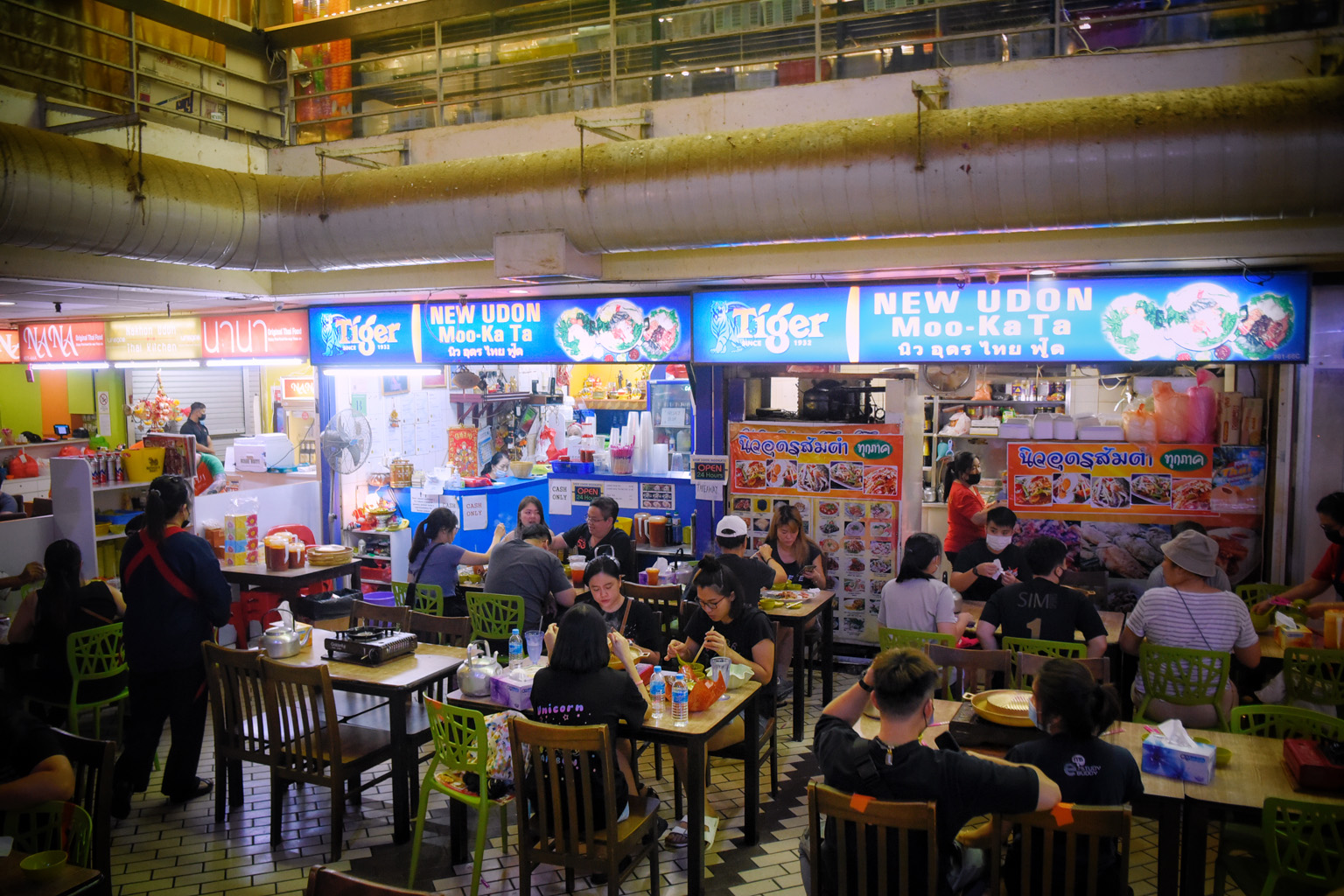 Diners at New Udon Thai Food yesterday. The eatery was fined for failing to ensure a 1m space between groups of diners. ST PHOTO: MARK CHEONG