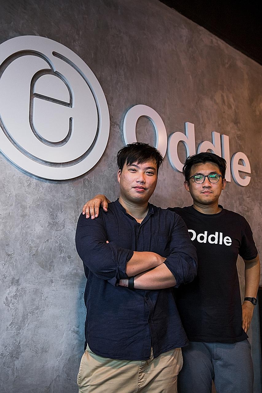 Mr Jonathan Lim (left) and Mr Pua Yong Xiang, two of the founders of technology start-up Oddle. The third, Mr Jeremy Lee, is not in the picture. Sources said deliberations to exit the company are at an early stage and the founders could decide to kee