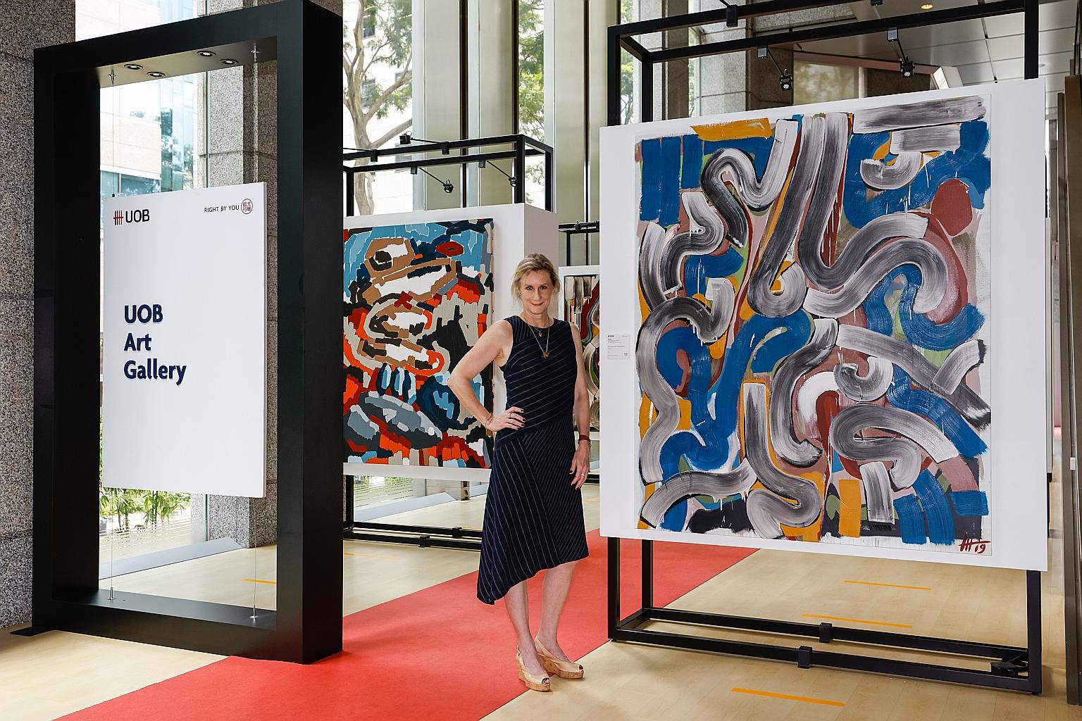 Artist Stefanie Hauger, a past winner of the UOB Painting of the Year competition, at her solo exhibition at the physical UOB Art Gallery.