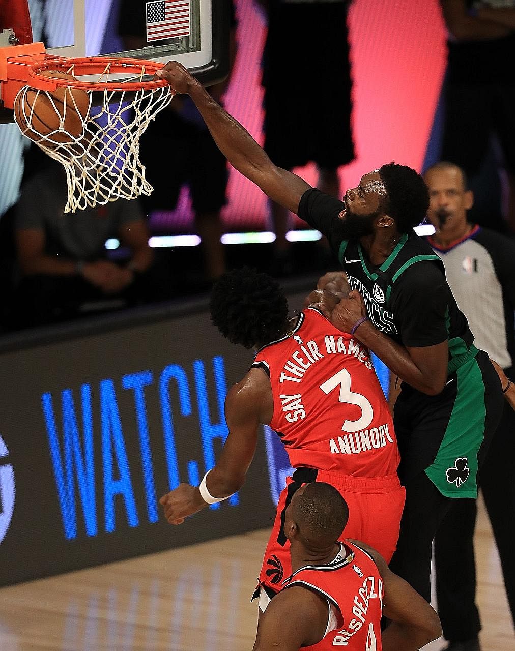 Celtics star Jaylen Brown dunking over Raptors forward O. G. Anunoby during Game 5 of their NBA Eastern Conference semi-final series. Brown had a game-high 27 points. PHOTO: AGENCE FRANCE-PRESSE
