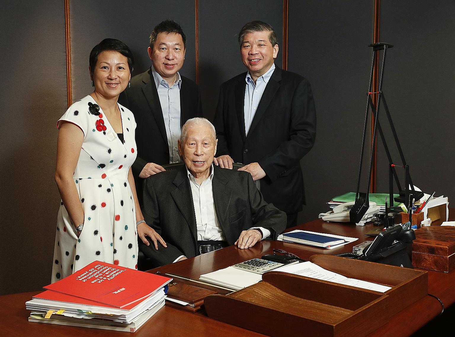 Mr Teo Woon Tiong pictured in 2018 with the second-generation business leaders of Pacific International Lines: (from left) executive director of corporate development Lisa Teo, executive director of the fleet division Teo Choo Wee and executive chair